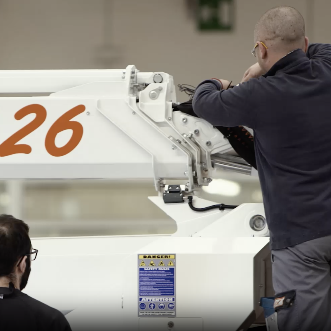 Person servicing machine